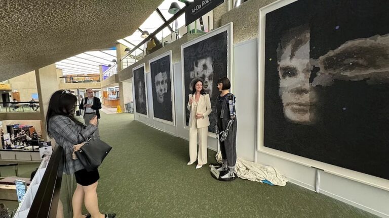 Ai-Da presenting the work "AI God Polyptych" at the United Nations in Geneva